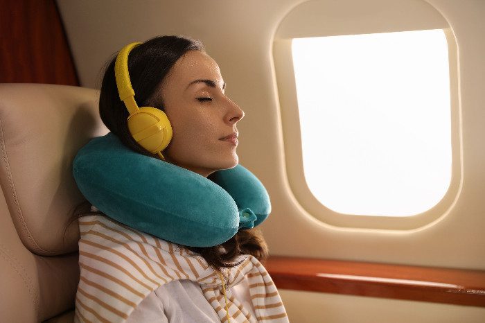 Purchase noise cancelling headphones for your business trip